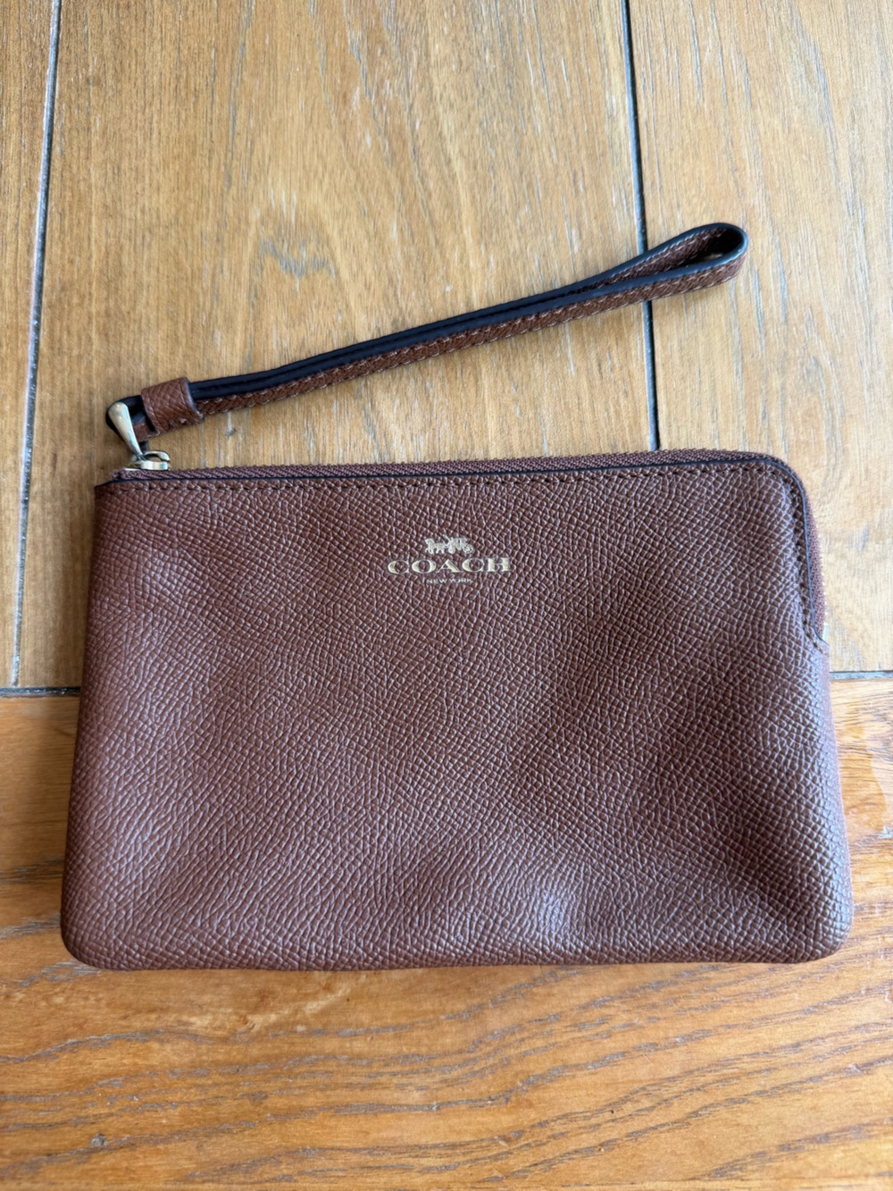 COACH Brown Pebbled Leather Wristlet with Gold Logo